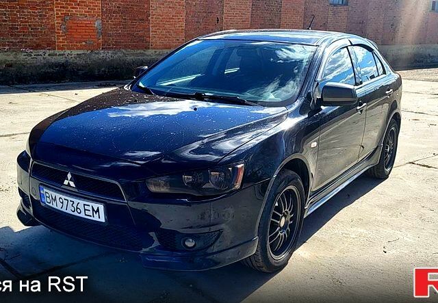 Черный Мицубиси Лансер, объемом двигателя 1.8 л и пробегом 256 тыс. км за 5800 $, фото 1 на Automoto.ua