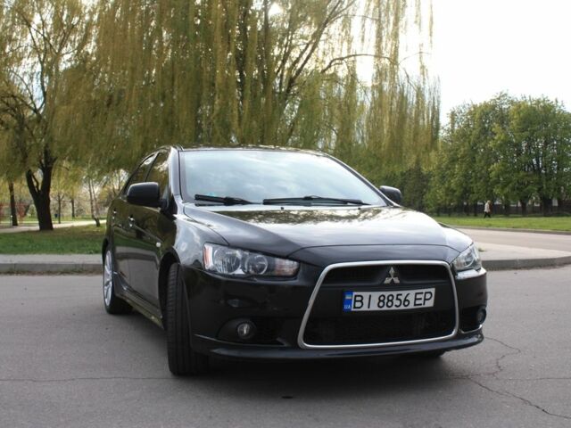Чорний Міцубісі Lancer, об'ємом двигуна 2 л та пробігом 341 тис. км за 5999 $, фото 1 на Automoto.ua