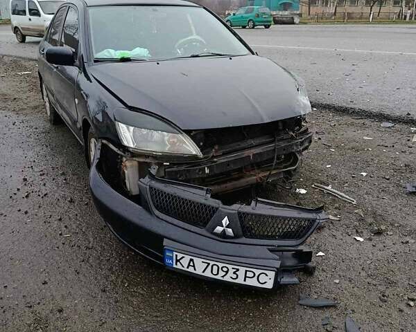 Чорний Міцубісі Lancer, об'ємом двигуна 1.6 л та пробігом 340 тис. км за 1776 $, фото 1 на Automoto.ua