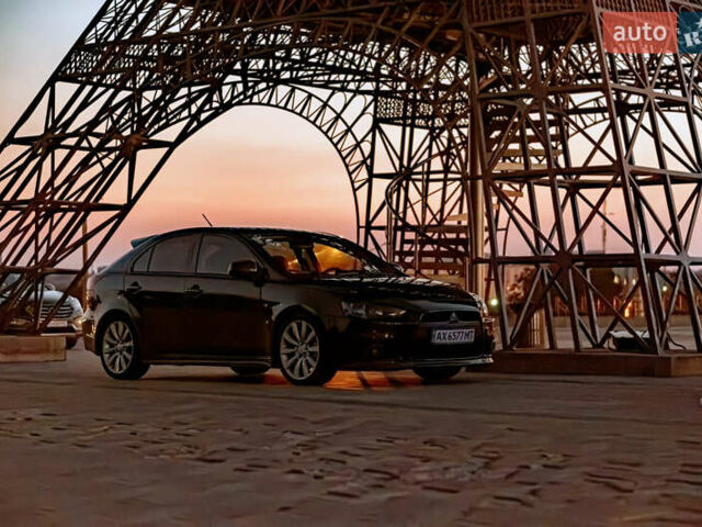 Чорний Міцубісі Lancer, об'ємом двигуна 3 л та пробігом 190 тис. км за 7000 $, фото 1 на Automoto.ua