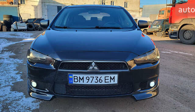 Черный Мицубиси Лансер, объемом двигателя 1.8 л и пробегом 255 тыс. км за 6000 $, фото 1 на Automoto.ua
