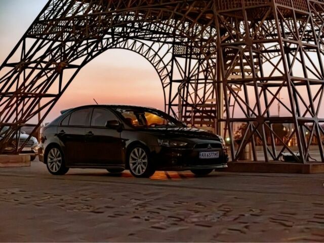 Чорний Міцубісі Lancer, об'ємом двигуна 2 л та пробігом 190 тис. км за 6900 $, фото 1 на Automoto.ua