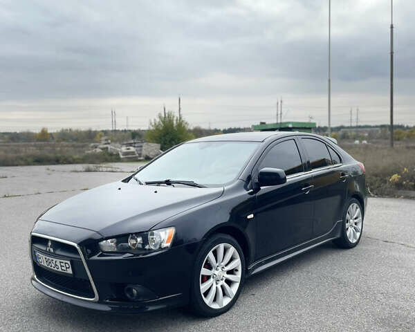 Черный Мицубиси Лансер, объемом двигателя 1.97 л и пробегом 300 тыс. км за 6800 $, фото 1 на Automoto.ua