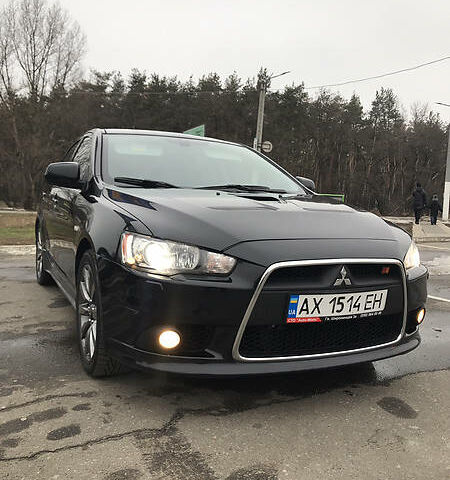 Чорний Міцубісі Lancer, об'ємом двигуна 2 л та пробігом 126 тис. км за 11200 $, фото 1 на Automoto.ua