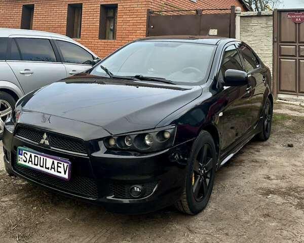 Мицубиси Лансер 2008 в Харькове на Automoto.ua Черный Мицубиси Лансер, объемом двигателя 1.8 л и пробегом 253 тыс. км за 4600 $, фото 1 на Automoto.ua