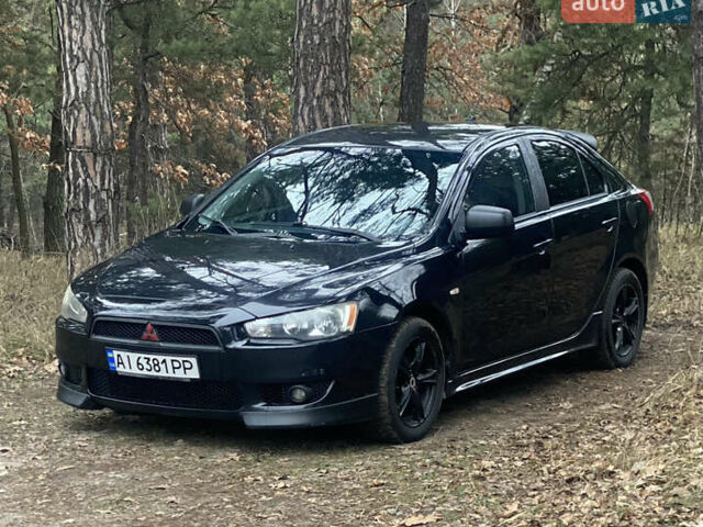 Черный Мицубиси Лансер, объемом двигателя 1.8 л и пробегом 218 тыс. км за 6800 $, фото 1 на Automoto.ua