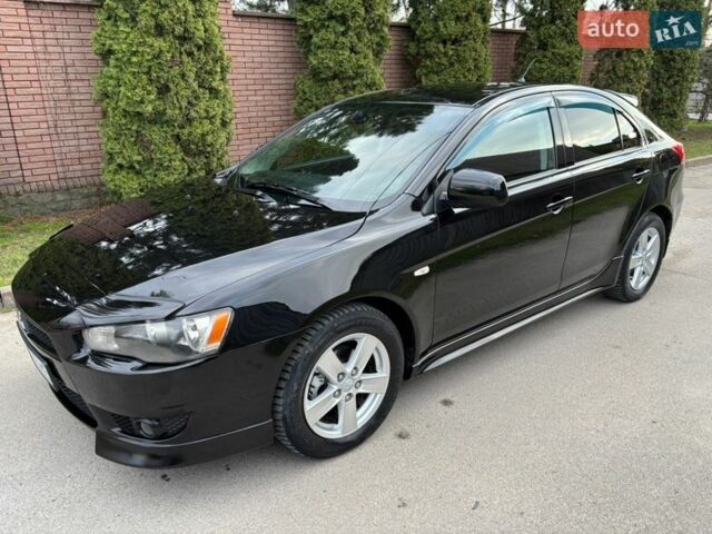 Черный Мицубиси Лансер, объемом двигателя 0 л и пробегом 186 тыс. км за 6600 $, фото 1 на Automoto.ua