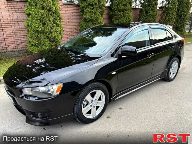 Черный Мицубиси Лансер, объемом двигателя 1.8 л и пробегом 186 тыс. км за 6600 $, фото 1 на Automoto.ua