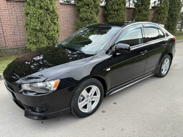 Черный Мицубиси Лансер, объемом двигателя 3.8 л и пробегом 186 тыс. км за 6600 $, фото 1 на Automoto.ua