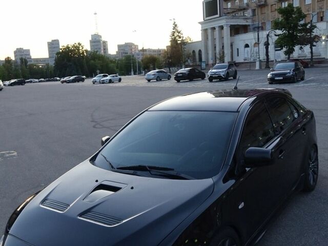 Чорний Міцубісі Lancer, об'ємом двигуна 2 л та пробігом 190 тис. км за 14500 $, фото 1 на Automoto.ua