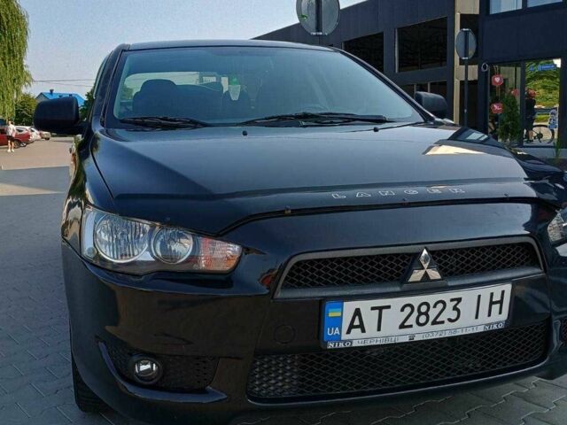Чорний Міцубісі Lancer, об'ємом двигуна 2 л та пробігом 145 тис. км за 5200 $, фото 1 на Automoto.ua
