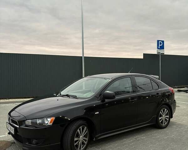 Чорний Міцубісі Lancer, об'ємом двигуна 1.8 л та пробігом 330 тис. км за 7000 $, фото 1 на Automoto.ua