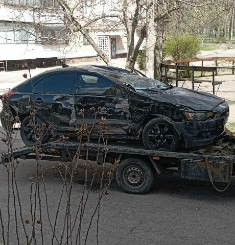 Черный Мицубиси Лансер, объемом двигателя 1.8 л и пробегом 206 тыс. км за 2500 $, фото 1 на Automoto.ua