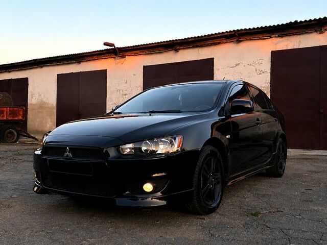 Чорний Міцубісі Lancer, об'ємом двигуна 1.8 л та пробігом 195 тис. км за 7900 $, фото 1 на Automoto.ua