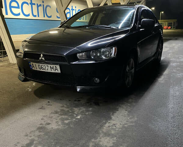 Черный Мицубиси Лансер, объемом двигателя 1.8 л и пробегом 220 тыс. км за 5500 $, фото 1 на Automoto.ua