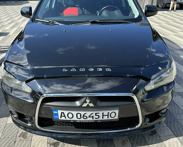 Чорний Міцубісі Lancer, об'ємом двигуна 1.8 л та пробігом 168 тис. км за 8500 $, фото 1 на Automoto.ua