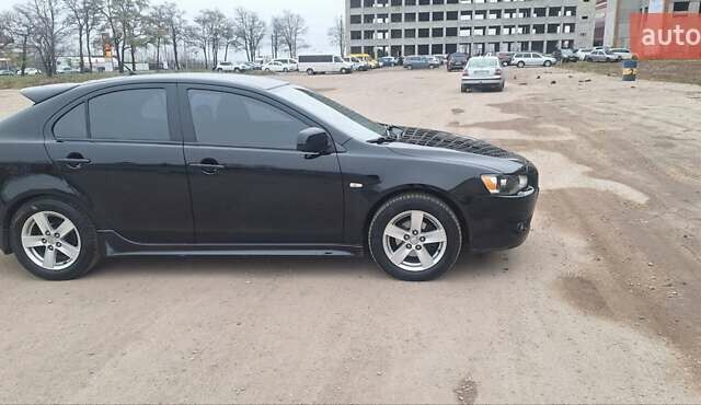 Чорний Міцубісі Lancer, об'ємом двигуна 1.8 л та пробігом 213 тис. км за 6200 $, фото 1 на Automoto.ua