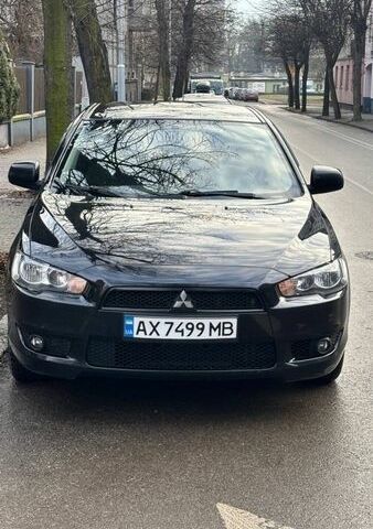 Черный Мицубиси Лансер, объемом двигателя 1.8 л и пробегом 137 тыс. км за 7200 $, фото 1 на Automoto.ua