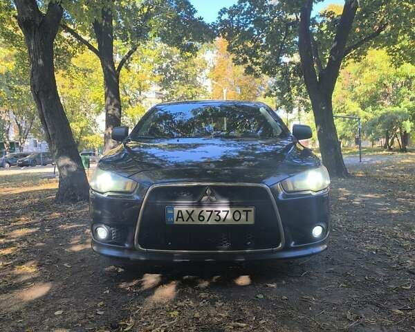 Черный Мицубиси Лансер, объемом двигателя 1.8 л и пробегом 370 тыс. км за 6800 $, фото 1 на Automoto.ua