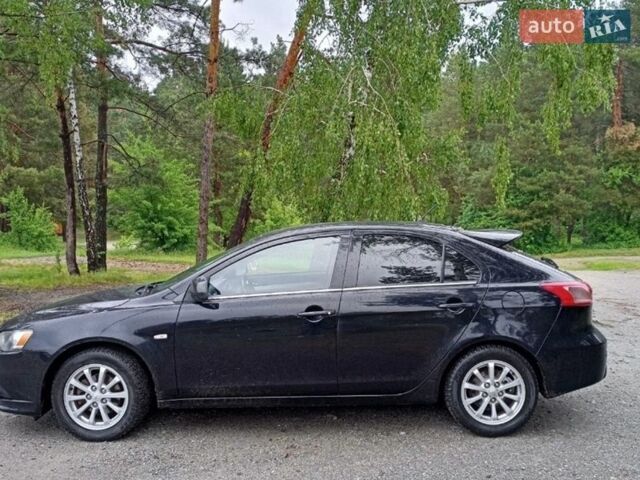 Черный Мицубиси Лансер, объемом двигателя 1.6 л и пробегом 306 тыс. км за 6961 $, фото 1 на Automoto.ua
