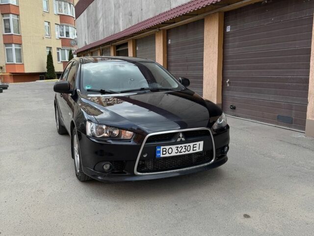 Чорний Міцубісі Lancer, об'ємом двигуна 2 л та пробігом 239 тис. км за 6000 $, фото 1 на Automoto.ua