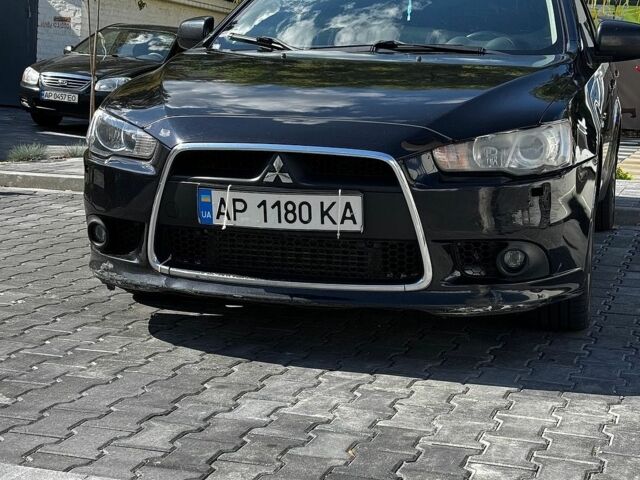 Чорний Міцубісі Lancer, об'ємом двигуна 1.8 л та пробігом 220 тис. км за 7500 $, фото 1 на Automoto.ua