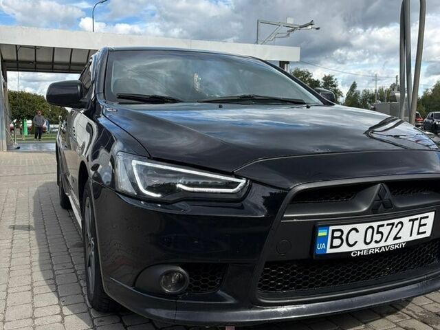 Чорний Міцубісі Lancer, об'ємом двигуна 1.6 л та пробігом 194 тис. км за 6400 $, фото 1 на Automoto.ua