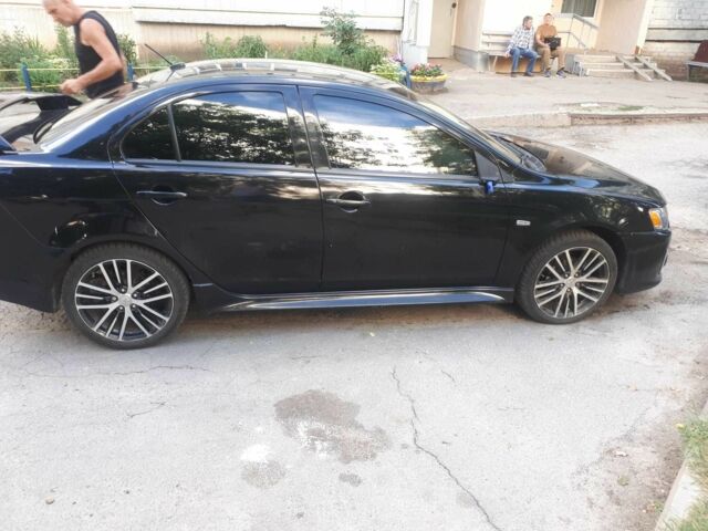 Чорний Міцубісі Lancer, об'ємом двигуна 2.4 л та пробігом 197 тис. км за 8276 $, фото 1 на Automoto.ua