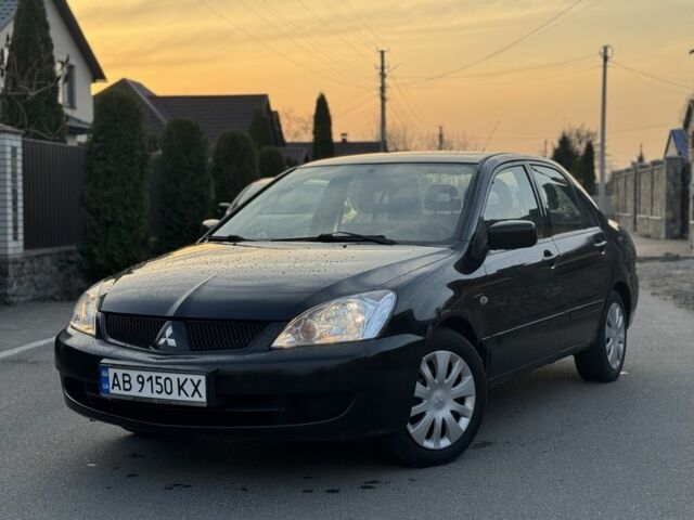 Чорний Міцубісі Lancer, об'ємом двигуна 1.6 л та пробігом 317 тис. км за 3200 $, фото 1 на Automoto.ua