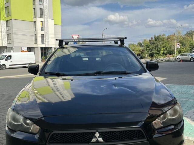 Чорний Міцубісі Lancer, об'ємом двигуна 2 л та пробігом 400 тис. км за 4900 $, фото 1 на Automoto.ua