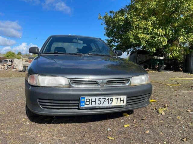 Чорний Міцубісі Lancer, об'ємом двигуна 1.3 л та пробігом 350 тис. км за 2300 $, фото 1 на Automoto.ua