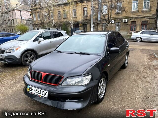 Чорний Міцубісі Lancer, об'ємом двигуна 1.6 л та пробігом 178 тис. км за 2200 $, фото 1 на Automoto.ua