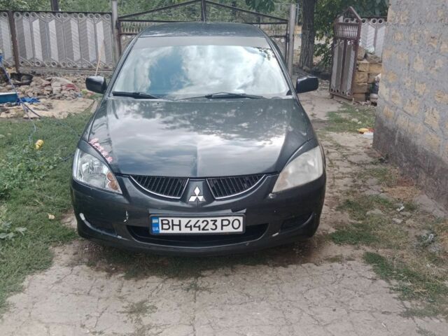 Чорний Міцубісі Lancer, об'ємом двигуна 1.6 л та пробігом 550 тис. км за 4500 $, фото 1 на Automoto.ua
