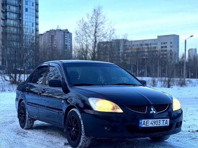 Чорний Міцубісі Lancer, об'ємом двигуна 1.6 л та пробігом 228 тис. км за 4599 $, фото 1 на Automoto.ua