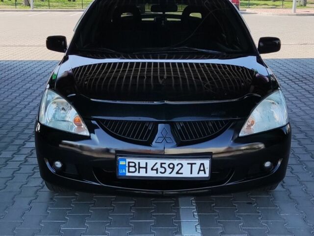 Чорний Міцубісі Lancer, об'ємом двигуна 1.6 л та пробігом 351 тис. км за 3950 $, фото 1 на Automoto.ua
