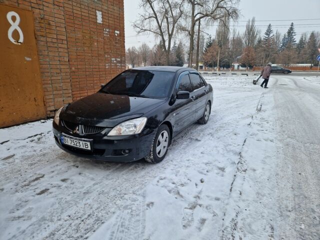 Чорний Міцубісі Lancer, об'ємом двигуна 1.6 л та пробігом 230 тис. км за 4100 $, фото 1 на Automoto.ua