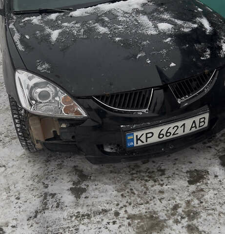 Чорний Міцубісі Lancer, об'ємом двигуна 1.6 л та пробігом 290 тис. км за 3200 $, фото 1 на Automoto.ua