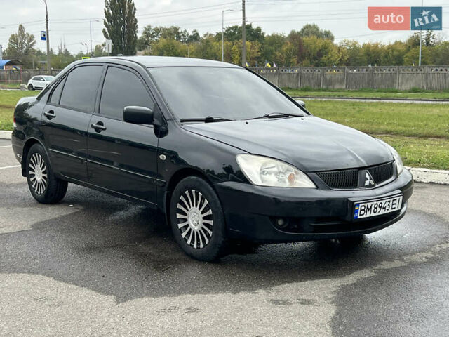 Чорний Міцубісі Lancer, об'ємом двигуна 1.58 л та пробігом 390 тис. км за 4500 $, фото 1 на Automoto.ua