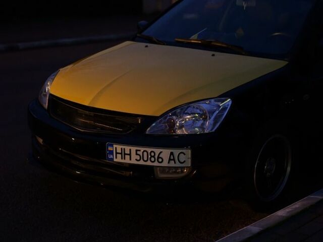 Чорний Міцубісі Lancer, об'ємом двигуна 1.6 л та пробігом 215 тис. км за 7200 $, фото 1 на Automoto.ua