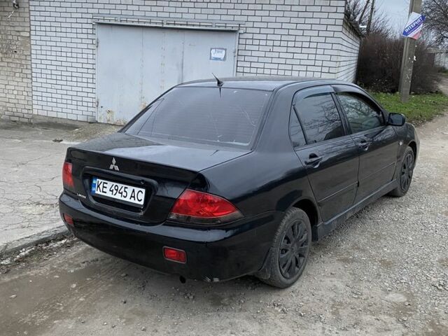 Чорний Міцубісі Lancer, об'ємом двигуна 1.6 л та пробігом 250 тис. км за 3500 $, фото 1 на Automoto.ua
