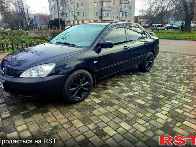 Чорний Міцубісі Lancer, об'ємом двигуна 1.6 л та пробігом 35000 тис. км за 3500 $, фото 1 на Automoto.ua