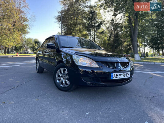 Мицубиси Лансер 2005 в Виннице на Automoto.ua Черный Мицубиси Лансер, объемом двигателя 1.6 л и пробегом 261 тыс. км за 4100 $, фото 1 на Automoto.ua