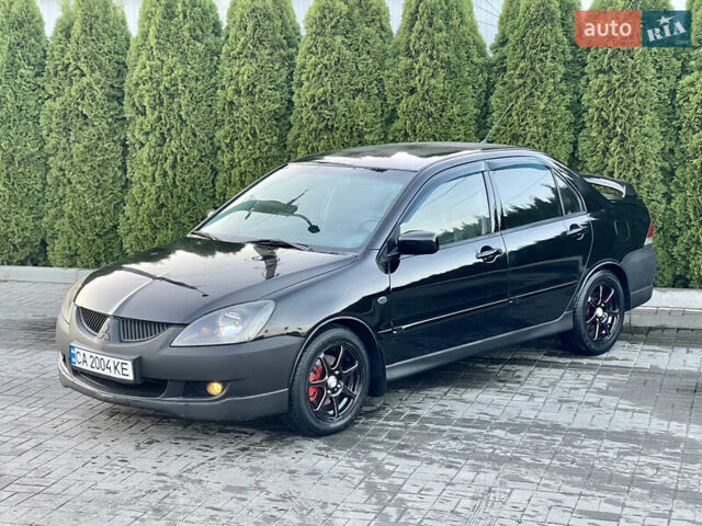 Мицубиси Лансер 2005 в Черкассах на Automoto.ua Черный Мицубиси Лансер, объемом двигателя 1.58 л и пробегом 368 тыс. км за 4400 $, фото 1 на Automoto.ua