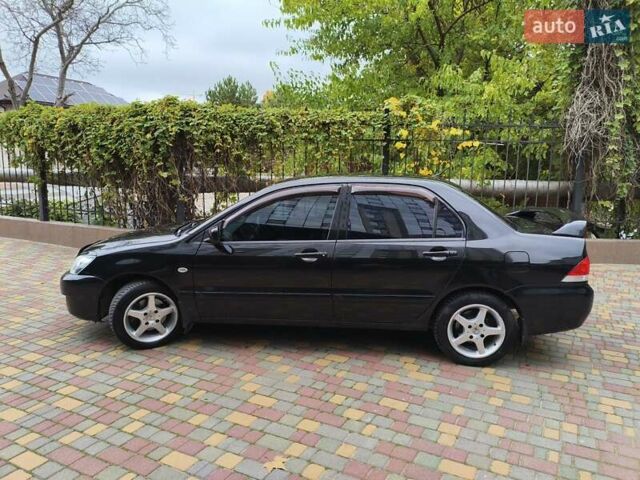 Мицубиси Лансер 2005 в Одессе на Automoto.ua Черный Мицубиси Лансер, объемом двигателя 1.58 л и пробегом 206 тыс. км за 3900 $, фото 1 на Automoto.ua