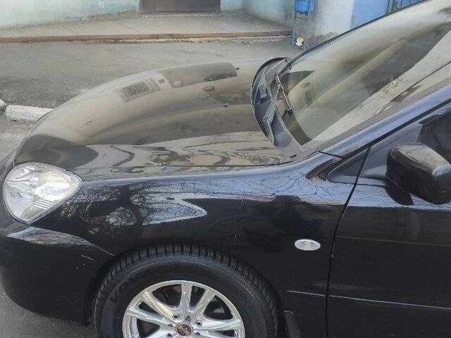 Черный Мицубиси Лансер, объемом двигателя 1.6 л и пробегом 201 тыс. км за 5000 $, фото 1 на Automoto.ua