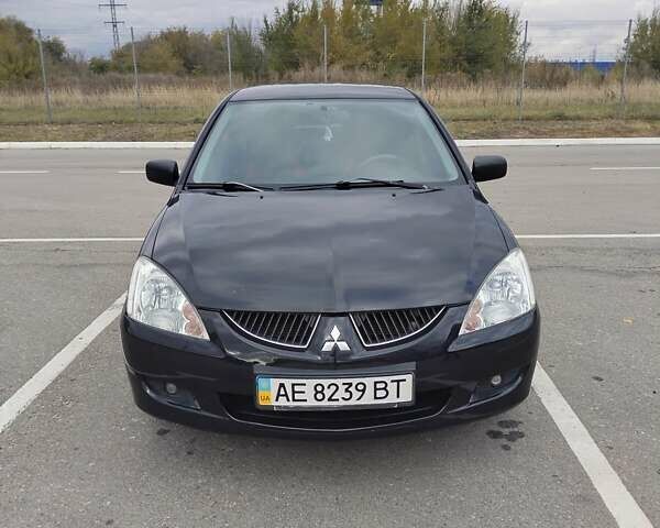 Міцубісі Lancer 2005 у Запоріжжя на Automoto.ua Чорний Міцубісі Lancer, об'ємом двигуна 1.58 л та пробігом 186 тис. км за 4700 $, фото 1 на Automoto.ua