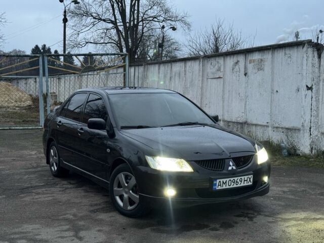 Чорний Міцубісі Lancer, об'ємом двигуна 1.6 л та пробігом 154 тис. км за 5500 $, фото 1 на Automoto.ua