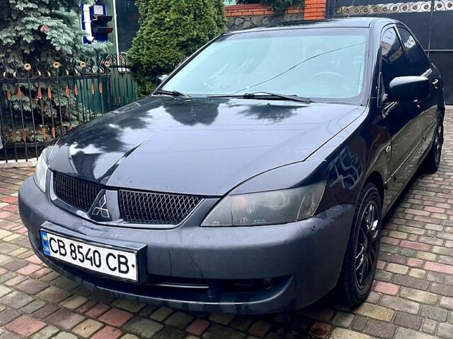 Чорний Міцубісі Lancer, об'ємом двигуна 1.6 л та пробігом 305 тис. км за 2950 $, фото 1 на Automoto.ua