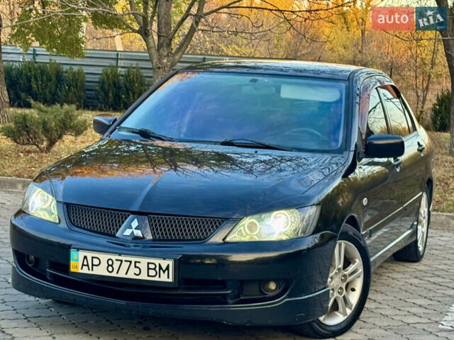 Міцубісі Lancer 2006 у Дніпро (Дніпропетровську) на Automoto.ua Чорний Міцубісі Lancer, об'ємом двигуна 2 л та пробігом 230 тис. км за 4900 $, фото 1 на Automoto.ua