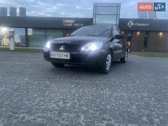 Черный Мицубиси Лансер, объемом двигателя 1.6 л и пробегом 231 тыс. км за 4250 $, фото 1 на Automoto.ua